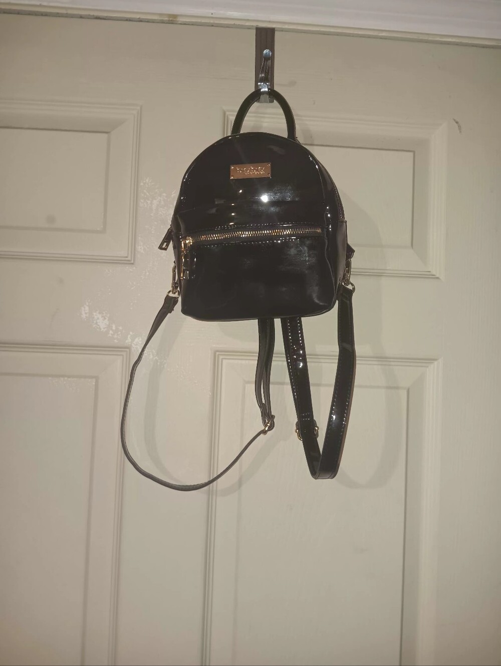 Bebe Faux Patent Leather Backpack Purse With Gold Hatdware Zip Shinny